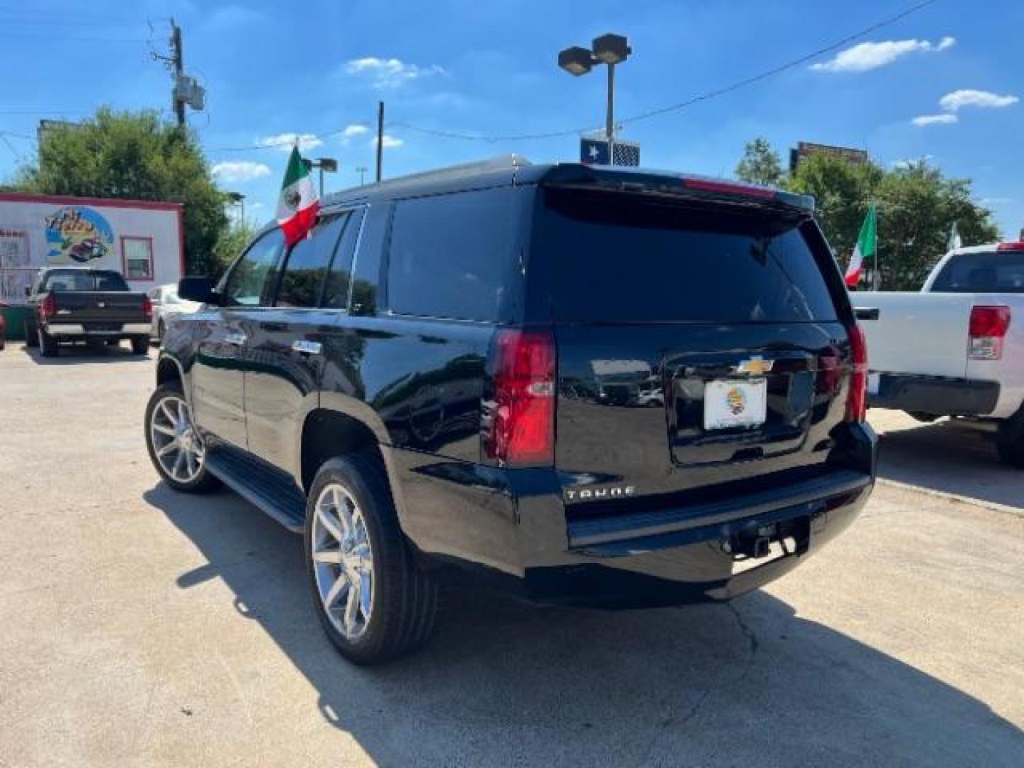 2016 Black Chevrolet Tahoe LT 2WD (1GNSCBKC0GR) with an 5.3L V8 OHV 16V engine, 6-Speed Automatic transmission, located at 7935 Gulf Freeway, Houston, 77017, (832) 266-1645, 29.684393, -95.275665 - Photo#4