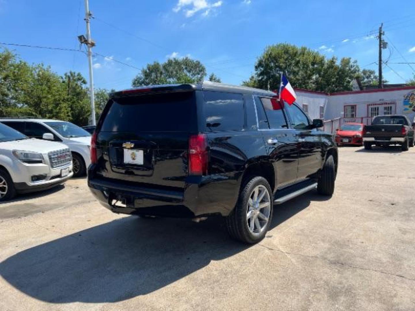 2016 Black Chevrolet Tahoe LT 2WD (1GNSCBKC0GR) with an 5.3L V8 OHV 16V engine, 6-Speed Automatic transmission, located at 7935 Gulf Freeway, Houston, 77017, (832) 266-1645, 29.684393, -95.275665 - Photo#6