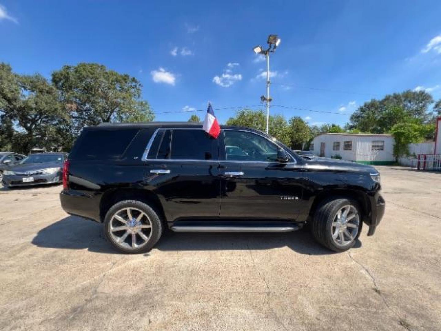 2016 Black Chevrolet Tahoe LT 2WD (1GNSCBKC0GR) with an 5.3L V8 OHV 16V engine, 6-Speed Automatic transmission, located at 7935 Gulf Freeway, Houston, 77017, (832) 266-1645, 29.684393, -95.275665 - Photo#7