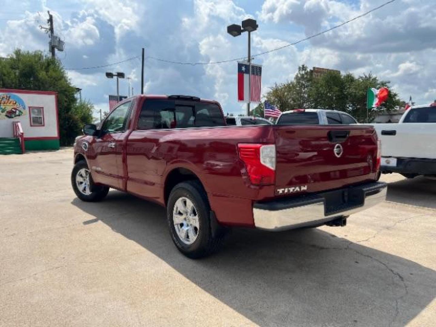 2017 Cayenne Red Nissan Titan SV Pickup 2D 8 ft (1N6AA1R79HN) with an 5.6L V8 DOHC 32V engine, 6-Speed Automatic transmission, located at 7935 Gulf Freeway, Houston, 77017, (832) 266-1645, 29.684393, -95.275665 - Photo#4