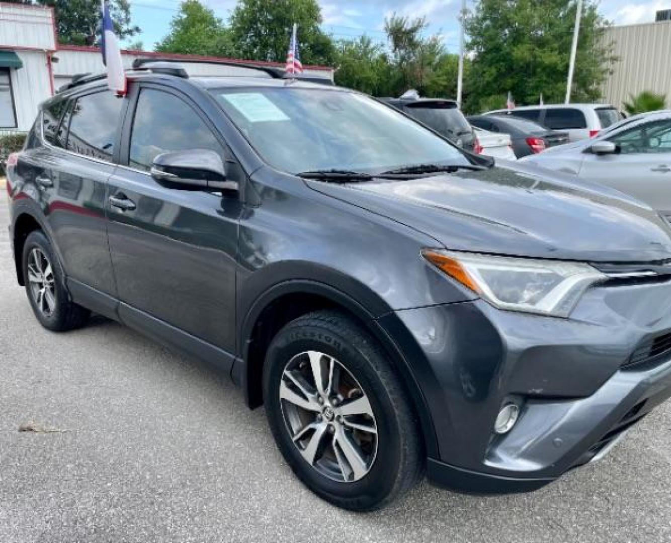 2018 Magnetic Gray Metallic Toyota RAV4 XLE FWD (JTMWFREVXJD) with an 2.5L L4 DOHC 16V engine, 6-Speed Automatic transmission, located at 4545 Spencer Hwy., Pasadena, 77504, (832) 266-1645, 29.666037, -95.173775 - Photo#0