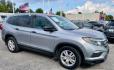 2017 Lunar Silver Metallic Honda Pilot LX 2WD (5FNYF5H14HB) with an 3.5L V6 SOHC 24V engine, 6-Speed Automatic transmission, located at 4545 Spencer Hwy., Pasadena, 77504, (832) 266-1645, 29.666037, -95.173775 - Photo#0