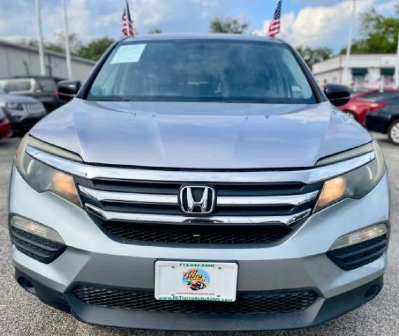 2017 Lunar Silver Metallic Honda Pilot LX 2WD (5FNYF5H14HB) with an 3.5L V6 SOHC 24V engine, 6-Speed Automatic transmission, located at 4545 Spencer Hwy., Pasadena, 77504, (832) 266-1645, 29.666037, -95.173775 - Photo#1