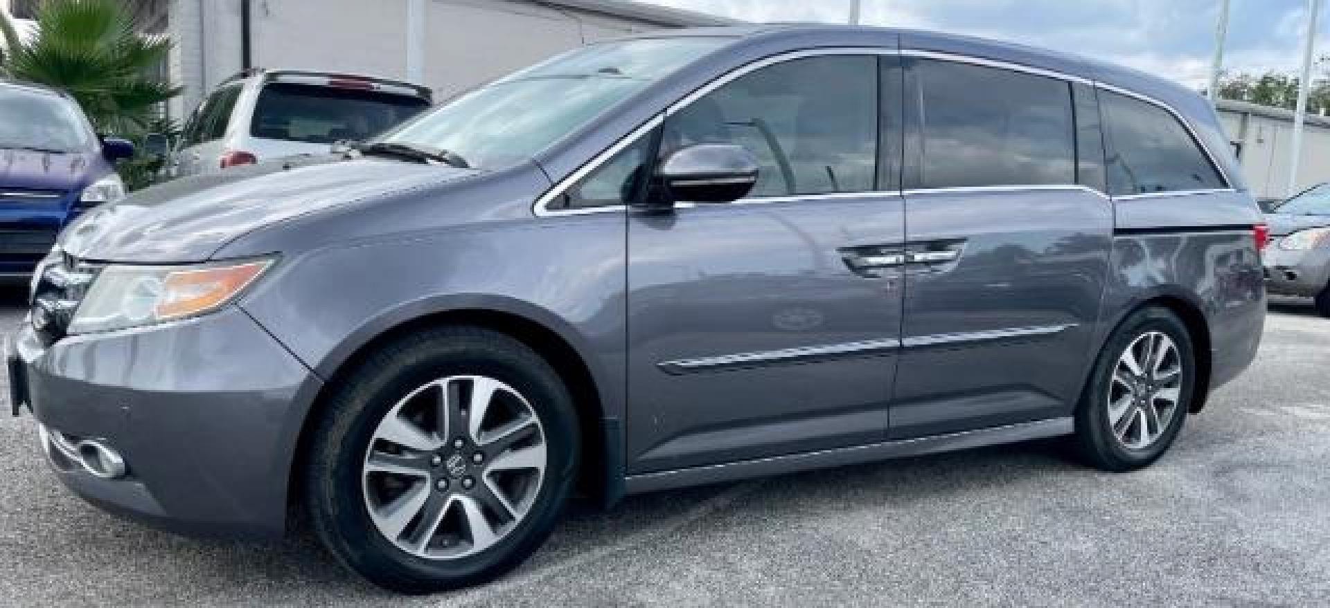 2015 Modern Steel Metallic Honda Odyssey Touring (5FNRL5H99FB) with an 3.5L V6 SOHC 24V engine, 6-Speed Automatic transmission, located at 4545 Spencer Hwy., Pasadena, 77504, (832) 266-1645, 29.666037, -95.173775 - Photo#0