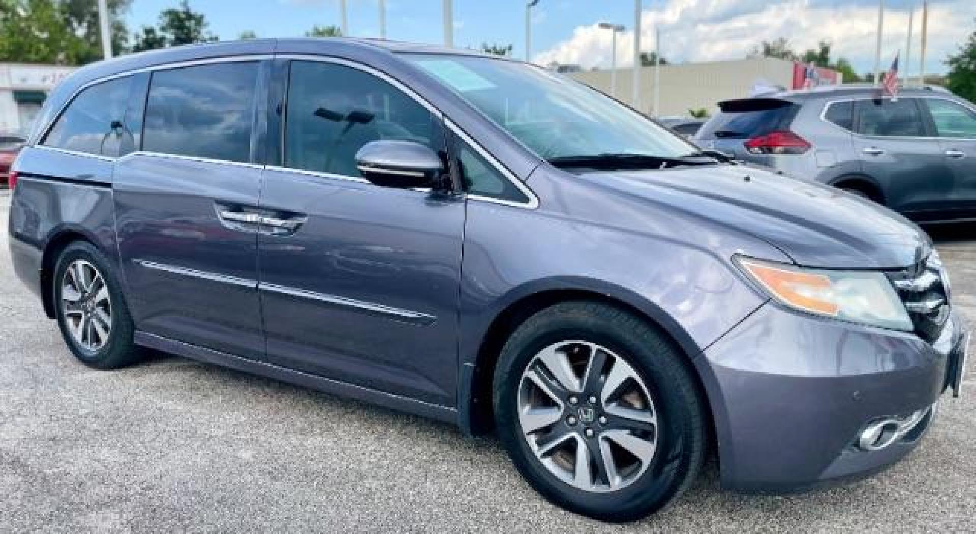 2015 Modern Steel Metallic Honda Odyssey Touring (5FNRL5H99FB) with an 3.5L V6 SOHC 24V engine, 6-Speed Automatic transmission, located at 4545 Spencer Hwy., Pasadena, 77504, (832) 266-1645, 29.666037, -95.173775 - Photo#2