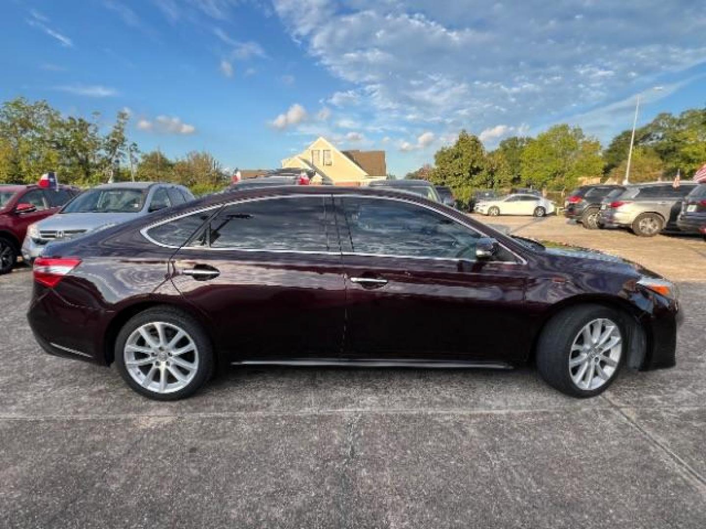 2015 Sizzling Crimson Mica Toyota Avalon Limited (4T1BK1EB6FU) with an 3.5L V6 DOHC 24V engine, 6-Speed Automatic transmission, located at 7935 Gulf Freeway, Houston, 77017, (832) 266-1645, 29.684393, -95.275665 - Photo#7