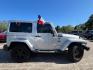 2012 Bright Silver Metallic with Black Soft Top Jeep Wrangler Sahara 4WD (1C4AJWBG1CL) with an 3.6L V6 DOHC 24V FFV engine, 5-Speed Automatic transmission, located at 7935 Gulf Freeway, Houston, 77017, (832) 266-1645, 29.684393, -95.275665 - Photo#7