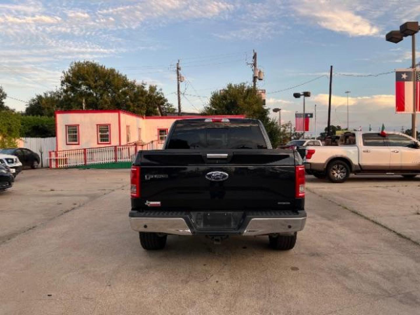 2015 Tuxedo Black Metallic Ford F-150 XLT SuperCrew 5.5-ft. Bed 2WD (1FTEW1CF8FF) with an 5.0L V8 engine, 6-Speed Automatic transmission, located at 7935 Gulf Freeway, Houston, 77017, (832) 266-1645, 29.684393, -95.275665 - Photo#5