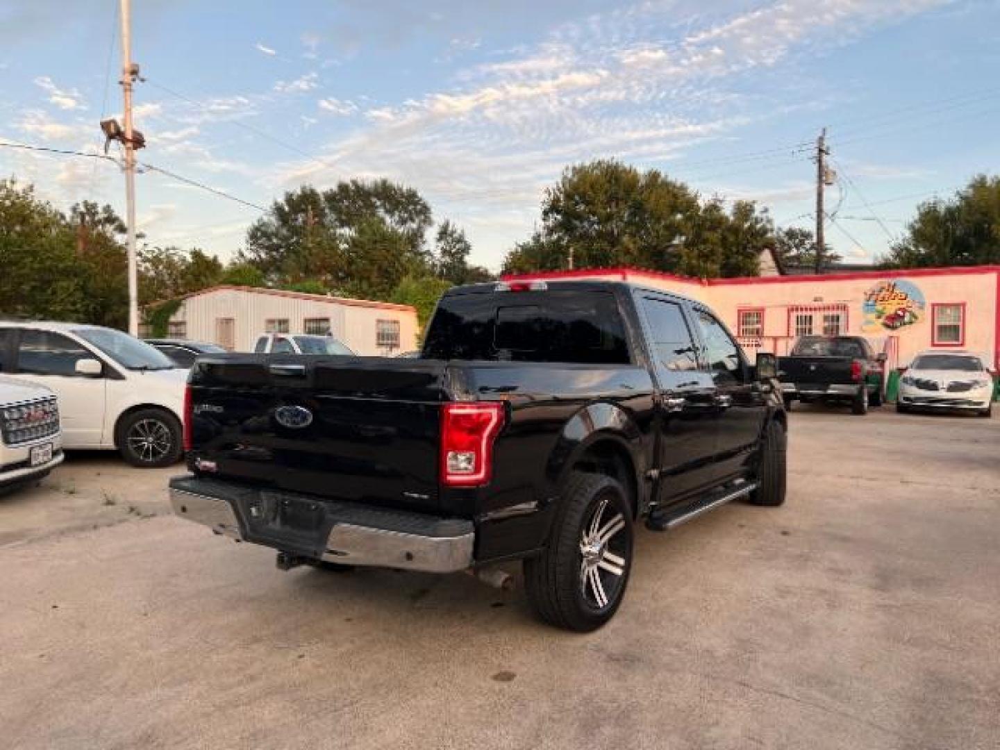 2015 Tuxedo Black Metallic Ford F-150 XLT SuperCrew 5.5-ft. Bed 2WD (1FTEW1CF8FF) with an 5.0L V8 engine, 6-Speed Automatic transmission, located at 7935 Gulf Freeway, Houston, 77017, (832) 266-1645, 29.684393, -95.275665 - Photo#6