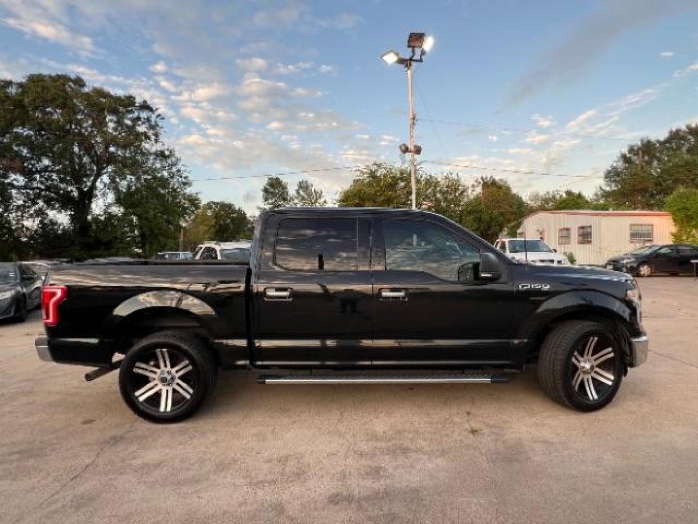 2015 Tuxedo Black Metallic Ford F-150 XLT SuperCrew 5.5-ft. Bed 2WD (1FTEW1CF8FF) with an 5.0L V8 engine, 6-Speed Automatic transmission, located at 7935 Gulf Freeway, Houston, 77017, (832) 266-1645, 29.684393, -95.275665 - Photo#7