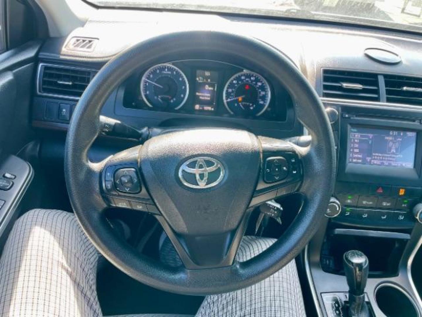 2016 GREEN Toyota Camry LE (4T4BF1FK2GR) with an 2.5L L4 DOHC 16V engine, 6-Speed Automatic transmission, located at 4545 Spencer Hwy., Pasadena, 77504, (832) 266-1645, 29.666037, -95.173775 - Photo#4