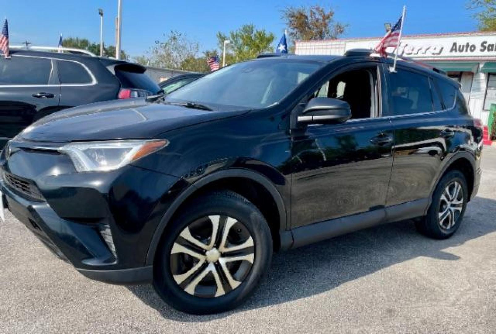 2018 Black Currant Metallic /Black, cloth Toyota RAV4 LE FWD (2T3ZFREV2JW) with an 2.5L L4 DOHC 16V engine, 6-Speed Automatic transmission, located at 4545 Spencer Hwy., Pasadena, 77504, (832) 266-1645, 29.666037, -95.173775 - Photo#0