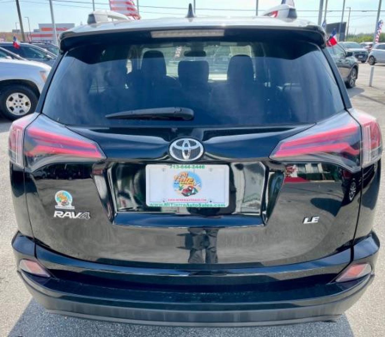 2018 Black Currant Metallic /Black, cloth Toyota RAV4 LE FWD (2T3ZFREV2JW) with an 2.5L L4 DOHC 16V engine, 6-Speed Automatic transmission, located at 4545 Spencer Hwy., Pasadena, 77504, (832) 266-1645, 29.666037, -95.173775 - Photo#3