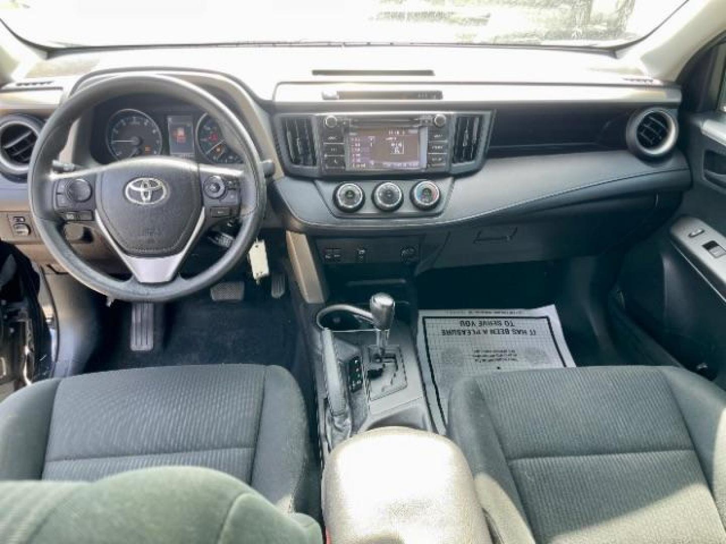 2018 Black Currant Metallic /Black, cloth Toyota RAV4 LE FWD (2T3ZFREV2JW) with an 2.5L L4 DOHC 16V engine, 6-Speed Automatic transmission, located at 4545 Spencer Hwy., Pasadena, 77504, (832) 266-1645, 29.666037, -95.173775 - Photo#4