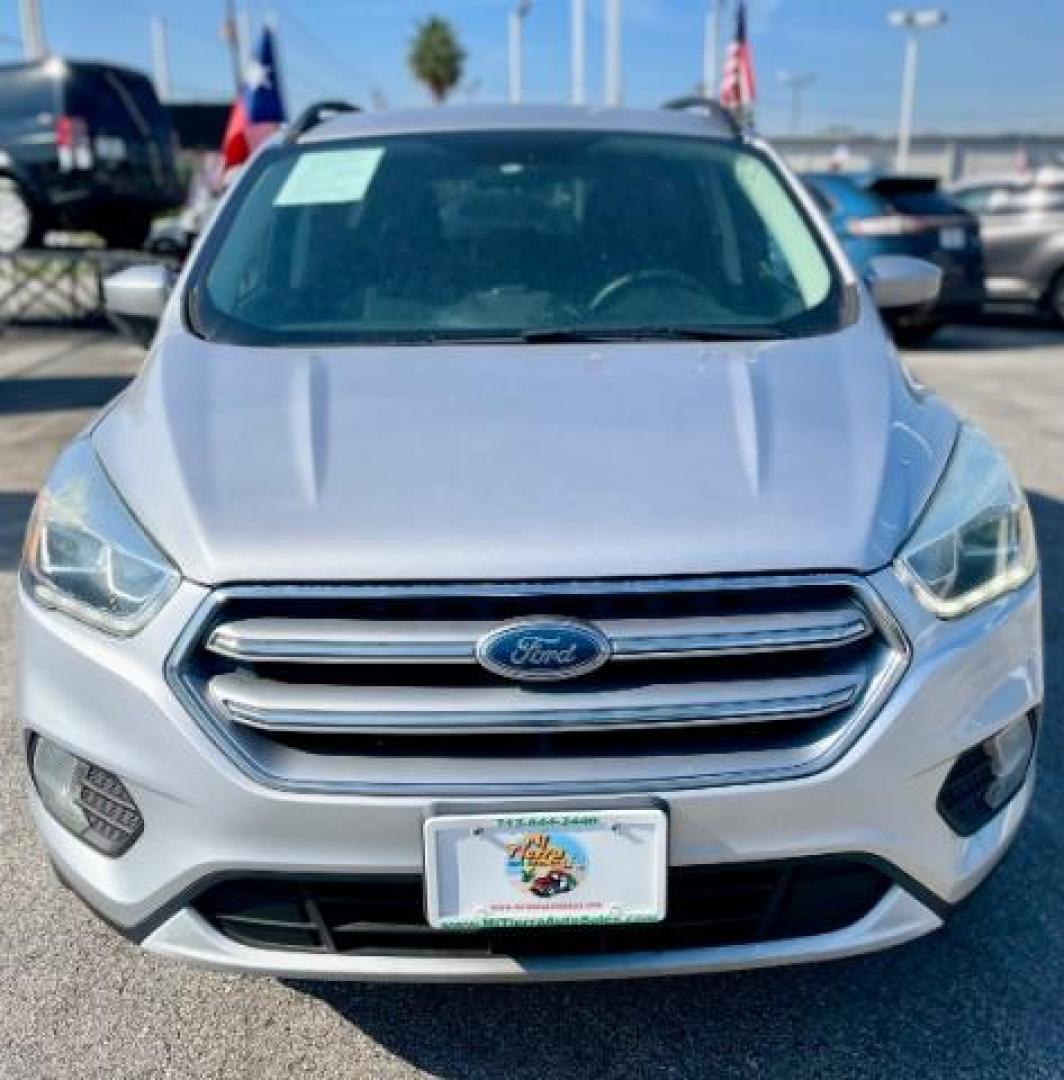 2017 Ingot Silver Metallic /Medium Light Stone, cloth Ford Escape SE FWD (1FMCU0GD5HU) with an 1.5L L4 DOHC 16V engine, 6-Speed Automatic transmission, located at 4545 Spencer Hwy., Pasadena, 77504, (832) 266-1645, 29.666037, -95.173775 - Photo#0