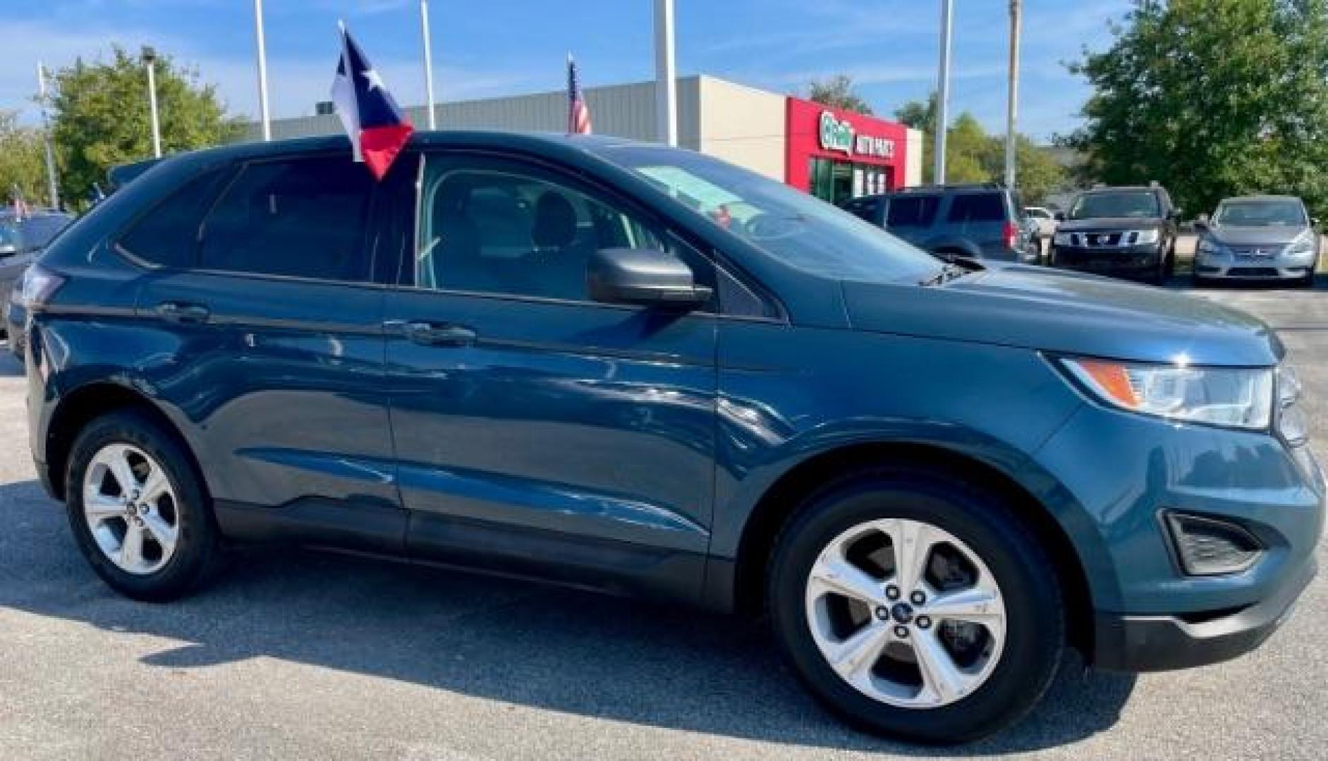 2016 Kona Blue Metallic /Ebony, cloth Ford Edge SE FWD (2FMPK3G9XGB) with an 2.0L L4 DOHC 16V engine, 6-Speed Automatic transmission, located at 4545 Spencer Hwy., Pasadena, 77504, (832) 266-1645, 29.666037, -95.173775 - Photo#1