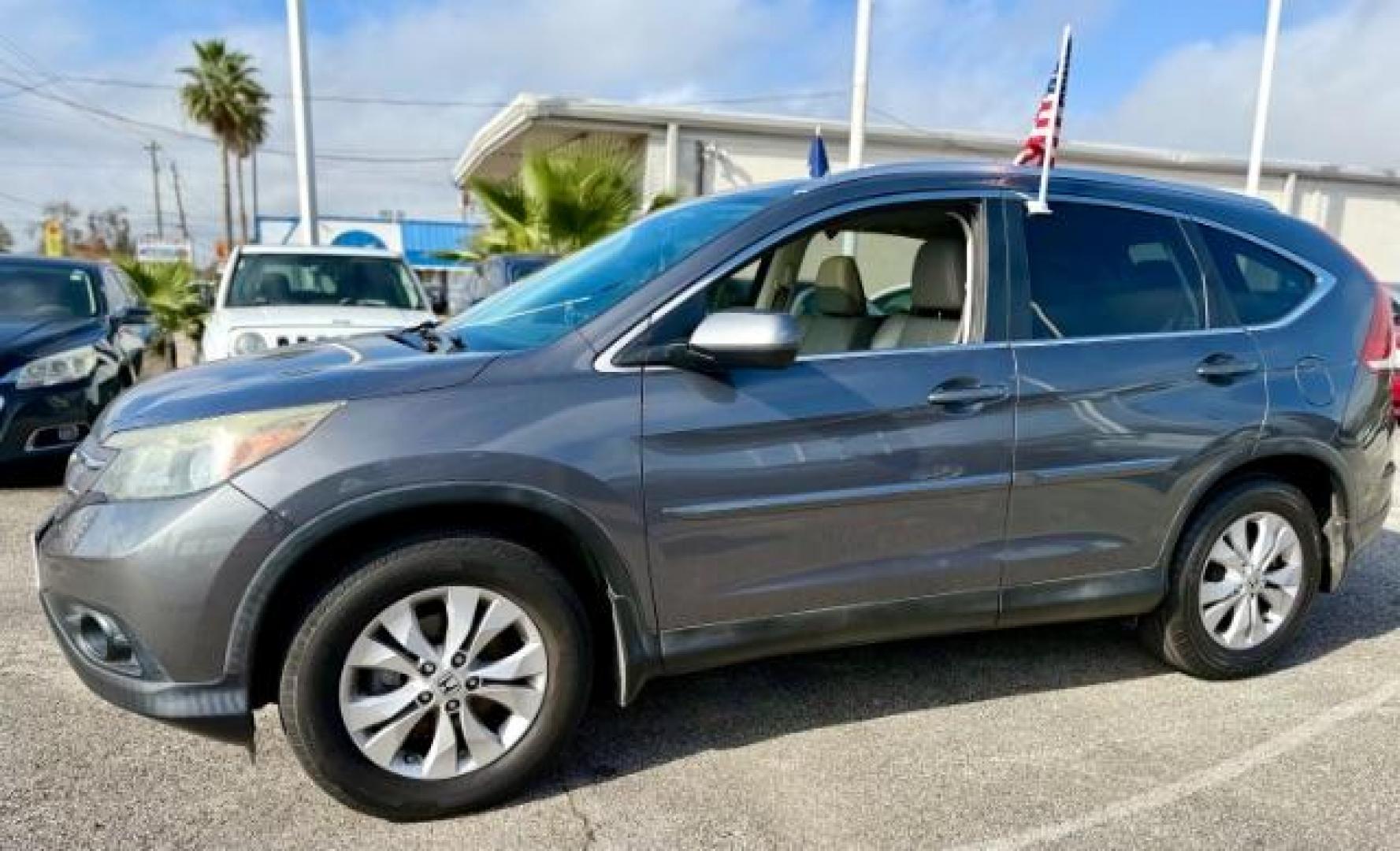 2014 Alabaster Silver Metallic /Gray Honda CR-V EX-L 2WD 5-Speed AT (2HKRM3H7XEH) with an 2.4L L4 DOHC 16V engine, 5-Speed Automatic transmission, located at 4545 Spencer Hwy., Pasadena, 77504, (832) 266-1645, 29.666037, -95.173775 - Photo#0