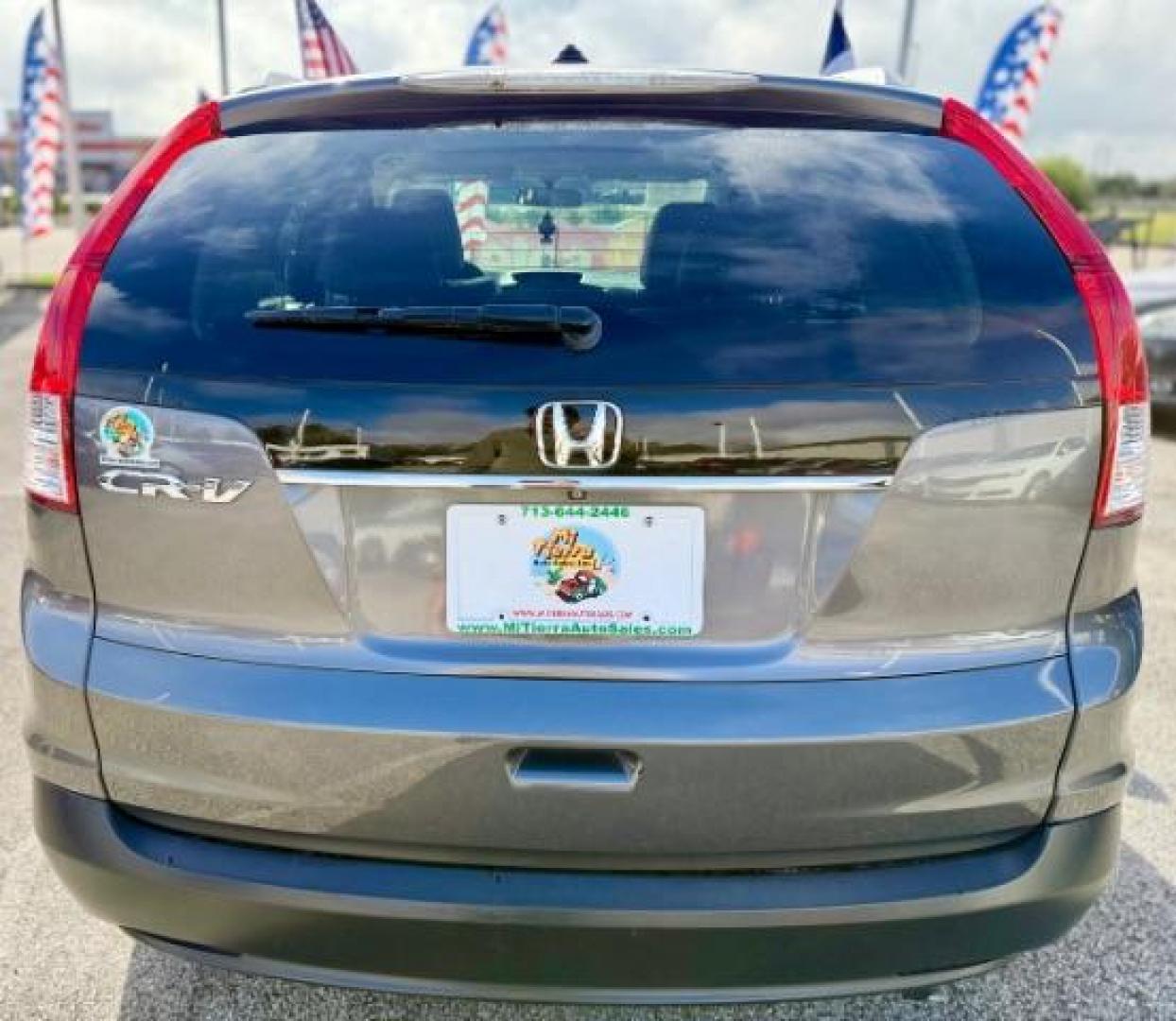 2014 Alabaster Silver Metallic /Gray Honda CR-V EX-L 2WD 5-Speed AT (2HKRM3H7XEH) with an 2.4L L4 DOHC 16V engine, 5-Speed Automatic transmission, located at 4545 Spencer Hwy., Pasadena, 77504, (832) 266-1645, 29.666037, -95.173775 - Photo#2