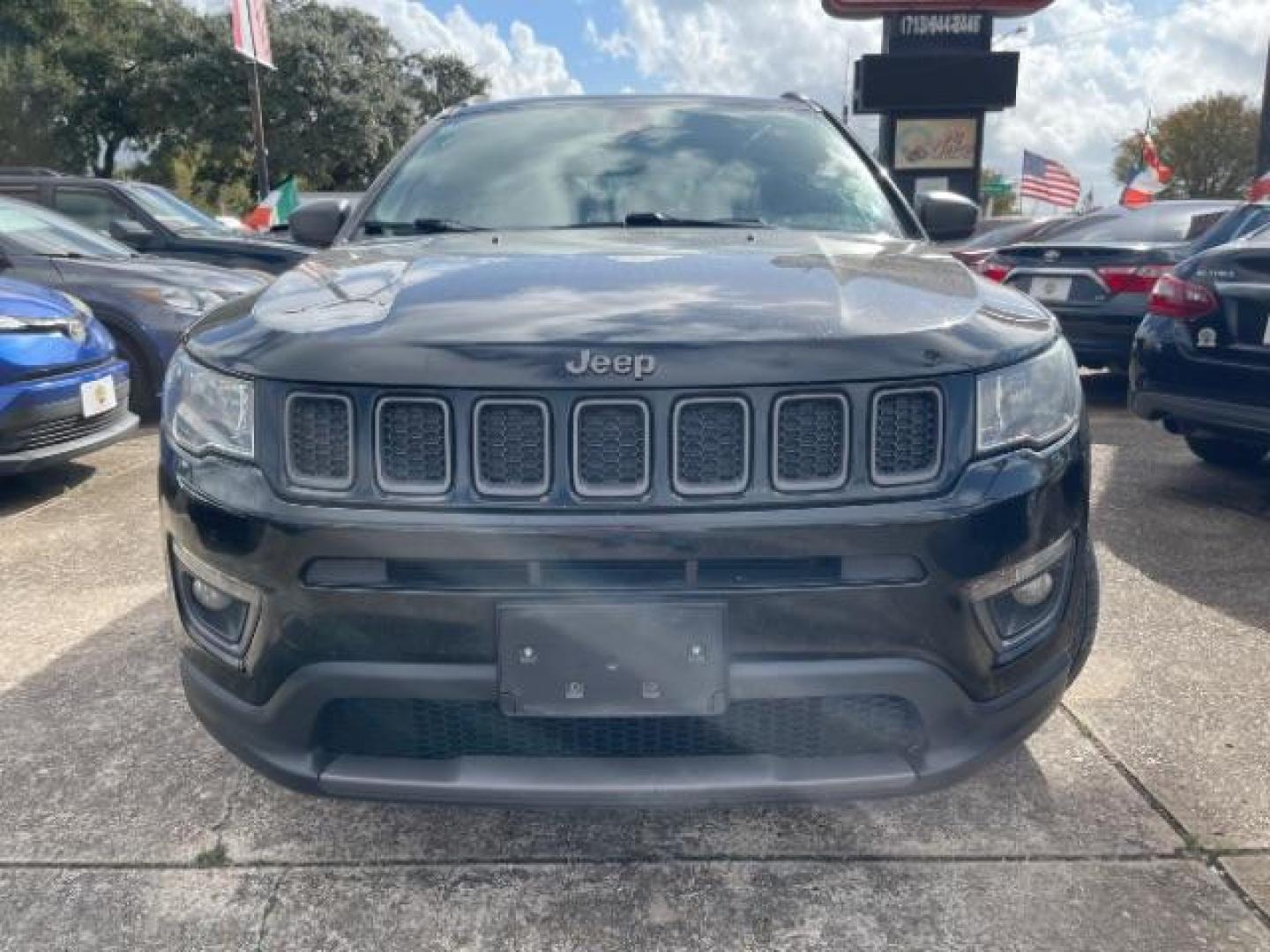 2021 Diamond Black Crystal Pearl Coat Jeep Compass 80th Spec Edition (3C4NJCEB2MT) with an 2.4L L4 DOHC 16V engine, located at 7935 Gulf Freeway, Houston, 77017, (832) 266-1645, 29.684393, -95.275665 - Photo#1