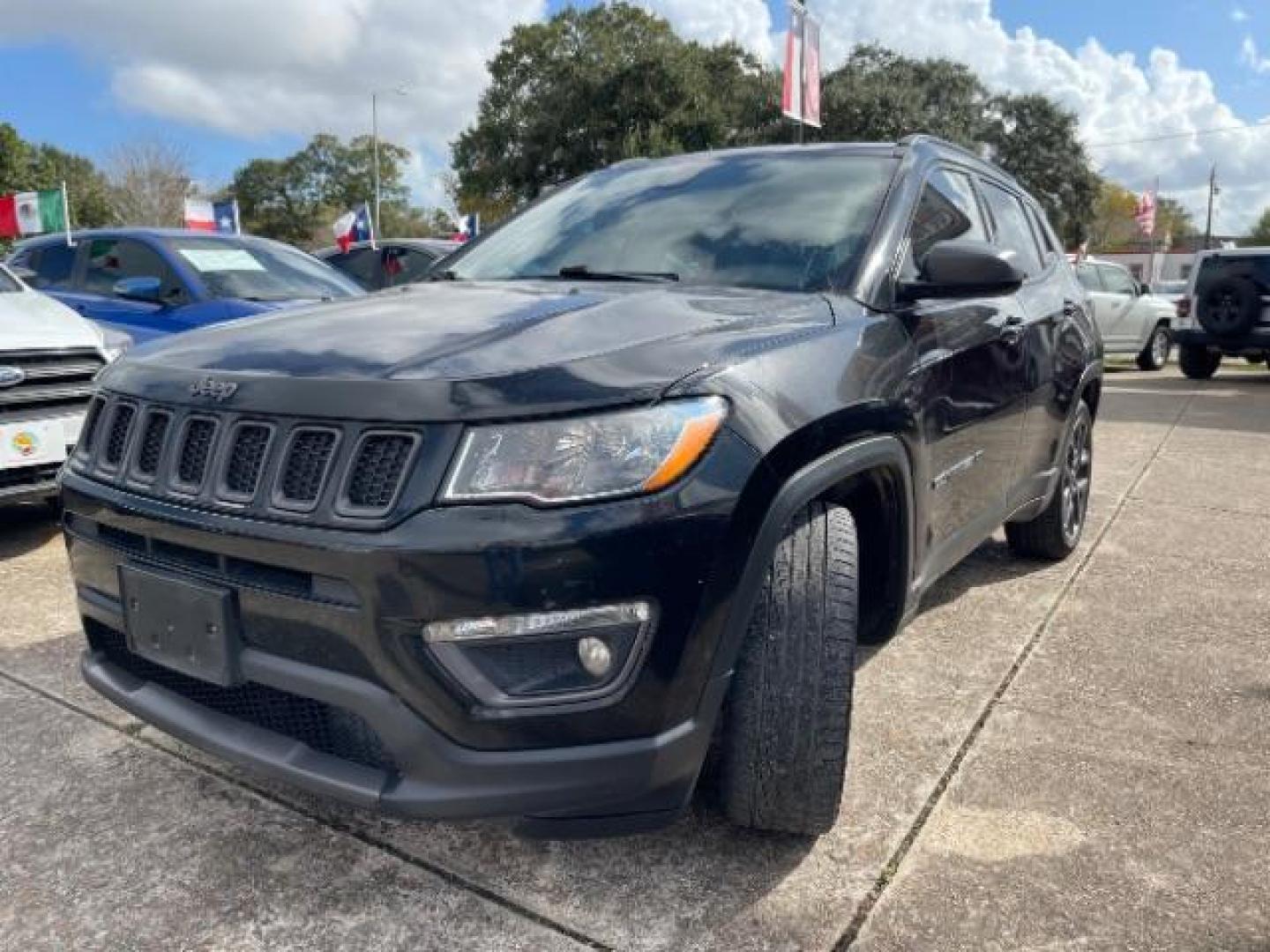 2021 Diamond Black Crystal Pearl Coat Jeep Compass 80th Spec Edition (3C4NJCEB2MT) with an 2.4L L4 DOHC 16V engine, located at 7935 Gulf Freeway, Houston, 77017, (832) 266-1645, 29.684393, -95.275665 - Photo#2