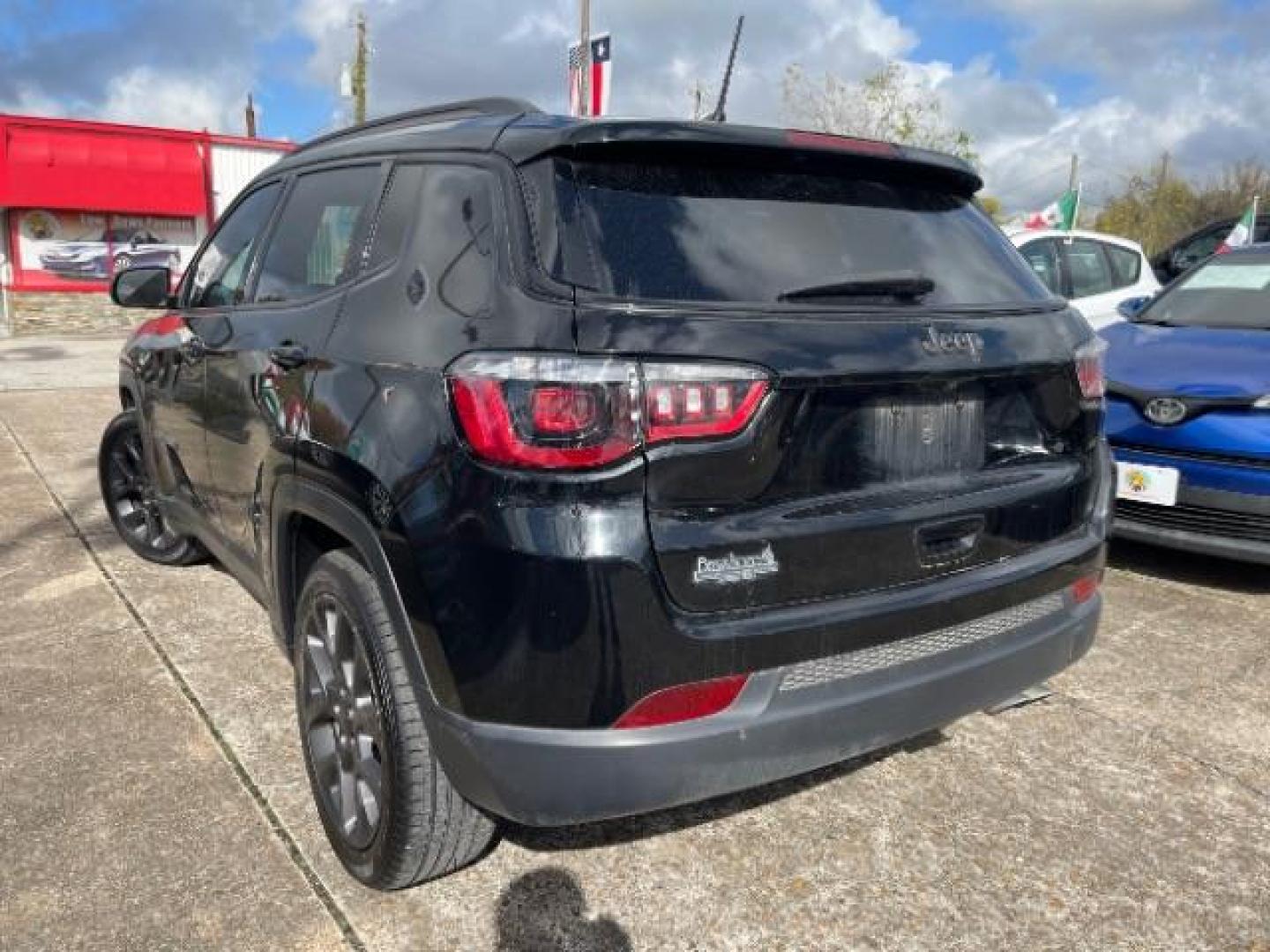 2021 Diamond Black Crystal Pearl Coat Jeep Compass 80th Spec Edition (3C4NJCEB2MT) with an 2.4L L4 DOHC 16V engine, located at 7935 Gulf Freeway, Houston, 77017, (832) 266-1645, 29.684393, -95.275665 - Photo#4