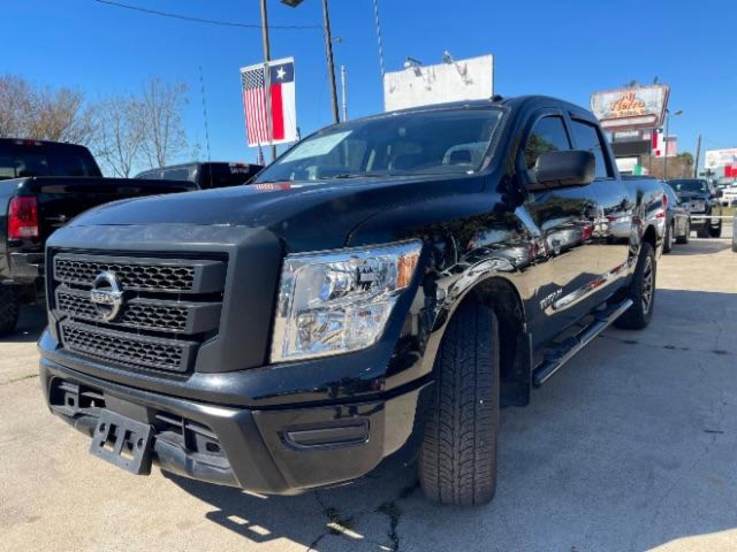 2021 Super Black Nissan Titan S Crew Cab 2WD (1N6AA1EE3MN) with an 5.6L V8 DOHC 32V engine, 9-Speed Automatic transmission, located at 7935 Gulf Freeway, Houston, 77017, (832) 266-1645, 29.684393, -95.275665 - Photo#2