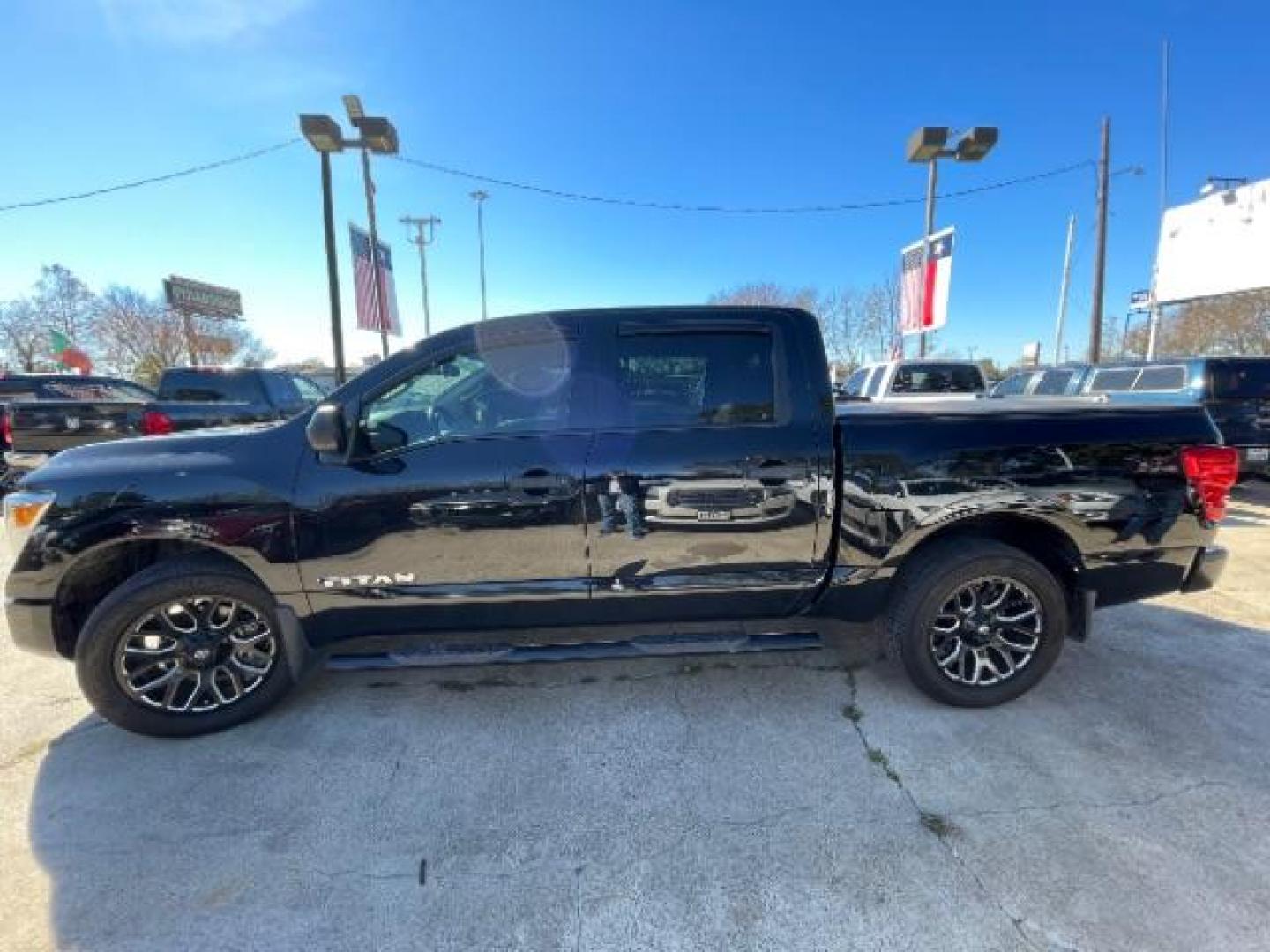 2021 Super Black Nissan Titan S Crew Cab 2WD (1N6AA1EE3MN) with an 5.6L V8 DOHC 32V engine, 9-Speed Automatic transmission, located at 7935 Gulf Freeway, Houston, 77017, (832) 266-1645, 29.684393, -95.275665 - Photo#3