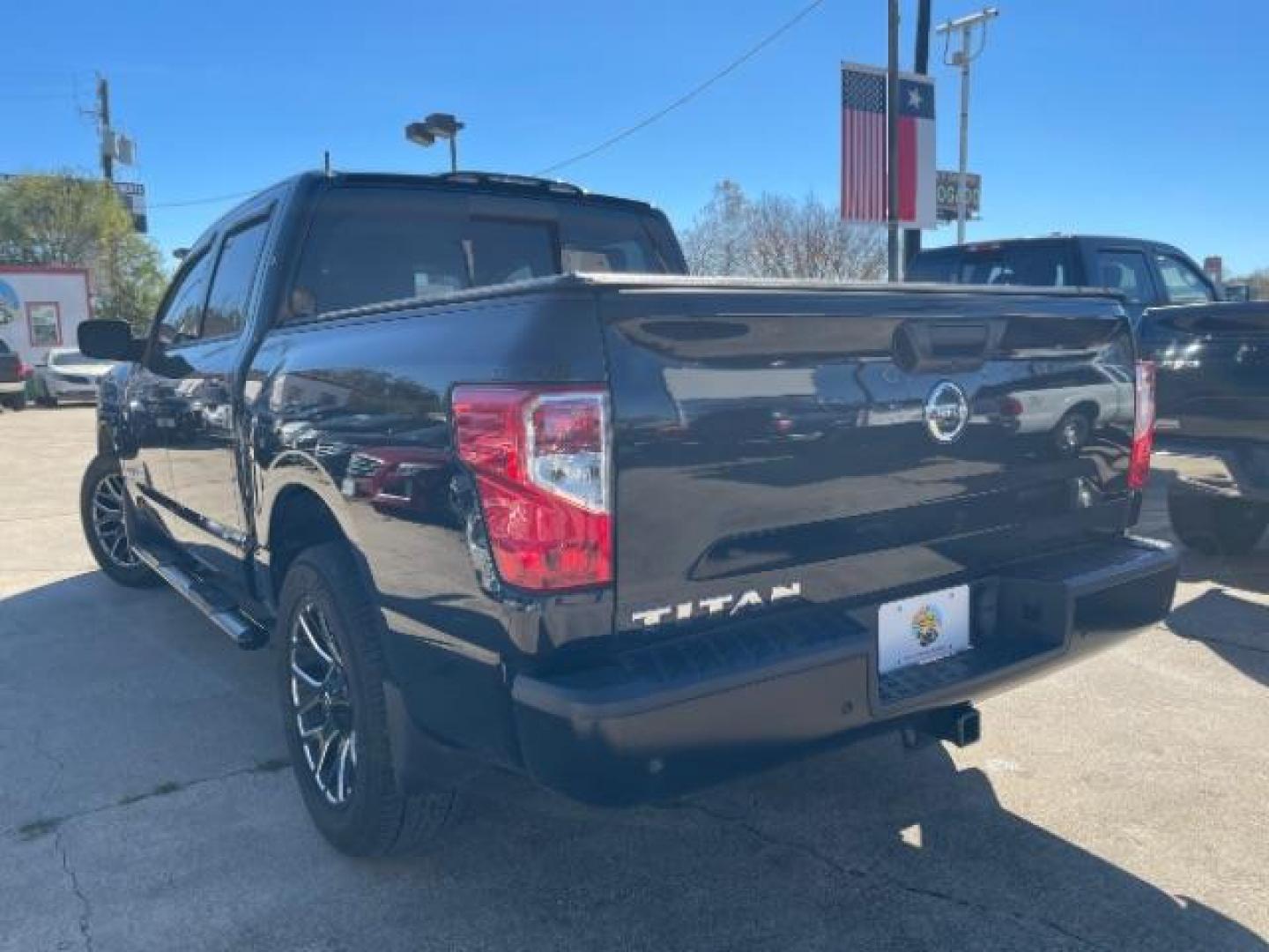 2021 Super Black Nissan Titan S Crew Cab 2WD (1N6AA1EE3MN) with an 5.6L V8 DOHC 32V engine, 9-Speed Automatic transmission, located at 7935 Gulf Freeway, Houston, 77017, (832) 266-1645, 29.684393, -95.275665 - Photo#4