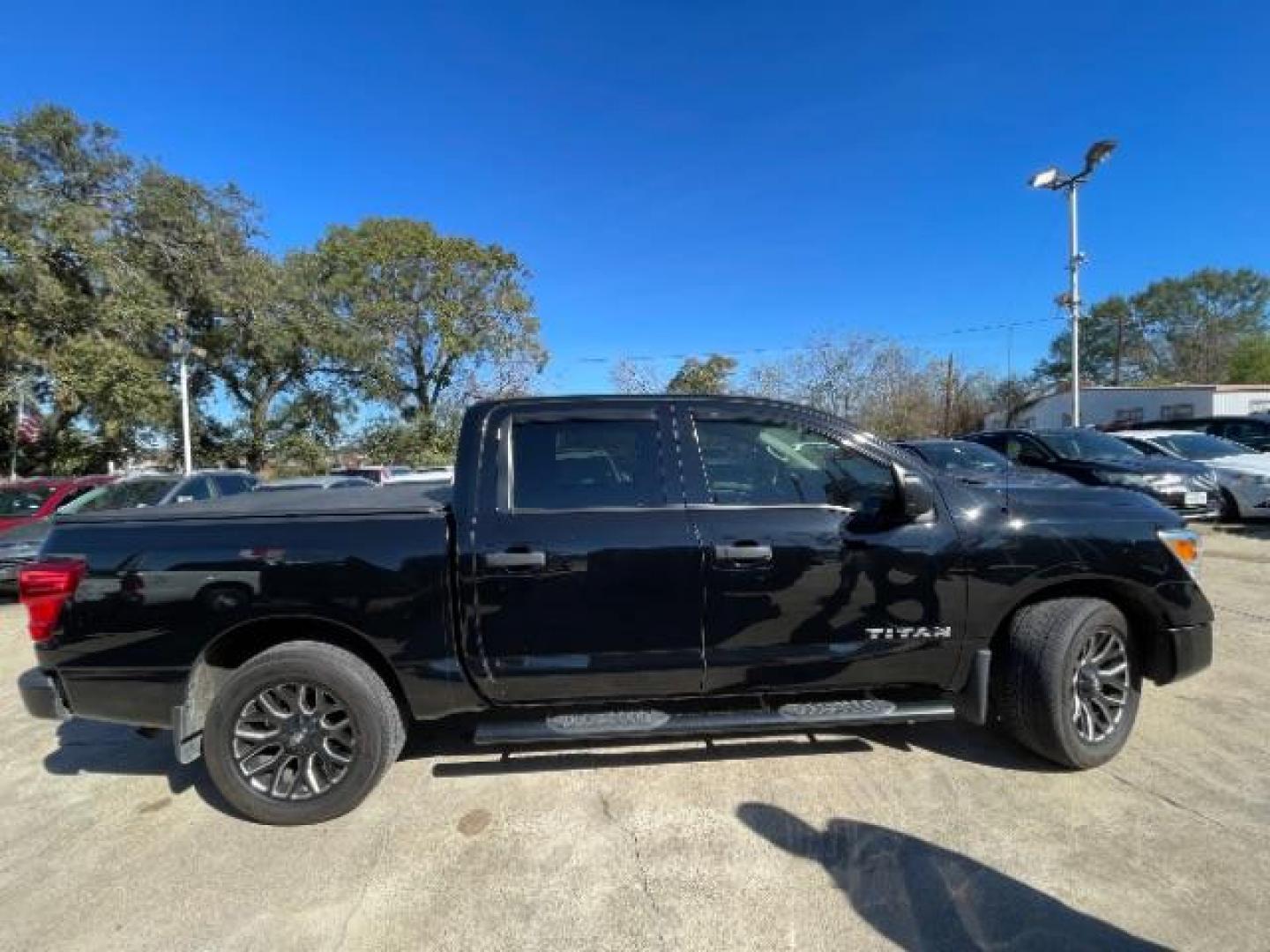 2021 Super Black Nissan Titan S Crew Cab 2WD (1N6AA1EE3MN) with an 5.6L V8 DOHC 32V engine, 9-Speed Automatic transmission, located at 7935 Gulf Freeway, Houston, 77017, (832) 266-1645, 29.684393, -95.275665 - Photo#7