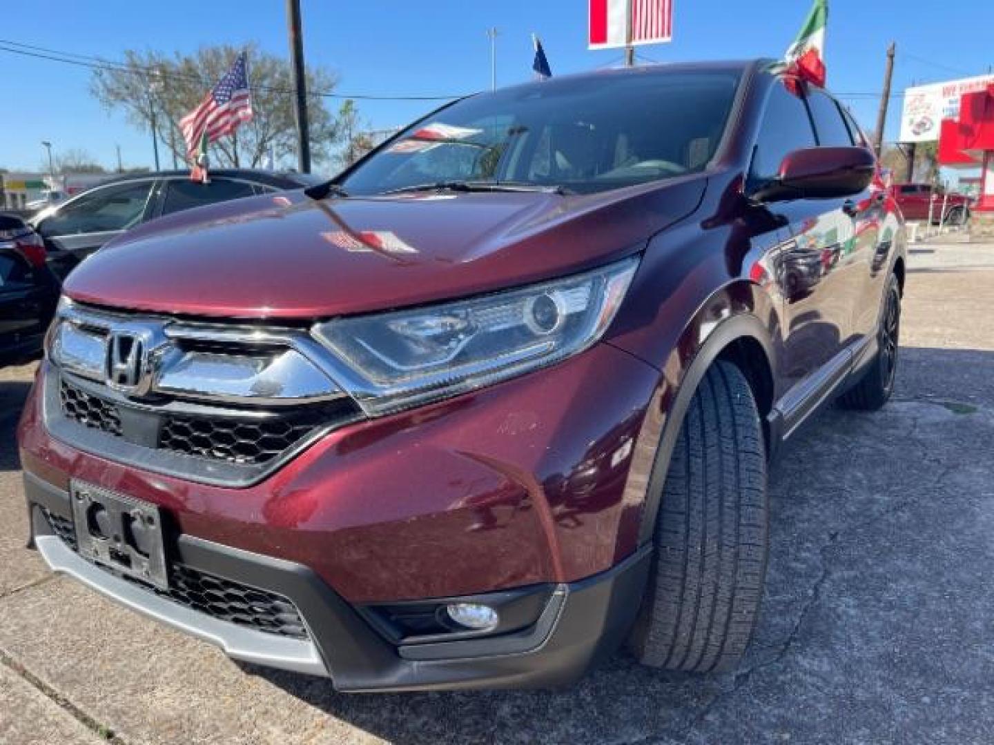 2017 Basque Red Pearl II Honda CR-V EX 2WD (7FARW1H58HE) with an 1.5L L4 16V DOHC TURBO engine, Continuously Variable Transmission transmission, located at 7935 Gulf Freeway, Houston, 77017, (832) 266-1645, 29.684393, -95.275665 - Photo#2