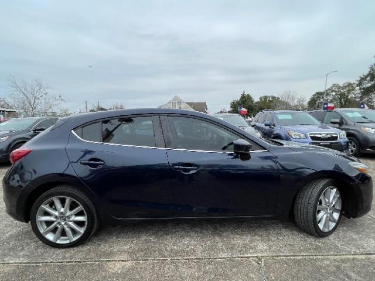 2017 Deep Crystal Blue Mica Mazda Mazda3 Touring Hatchback 4D (3MZBN1L75HM) with an 2.0 engine, Automatic transmission, located at 7935 Gulf Freeway, Houston, 77017, (832) 266-1645, 29.684393, -95.275665 - Photo#22