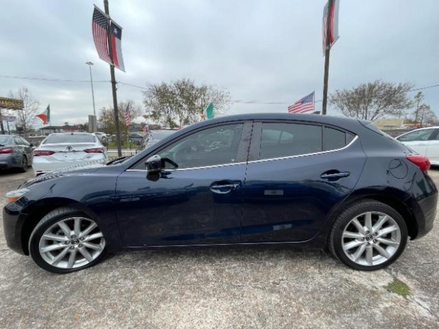 2017 Deep Crystal Blue Mica Mazda Mazda3 Touring Hatchback 4D (3MZBN1L75HM) with an 2.0 engine, Automatic transmission, located at 7935 Gulf Freeway, Houston, 77017, (832) 266-1645, 29.684393, -95.275665 - Photo#18