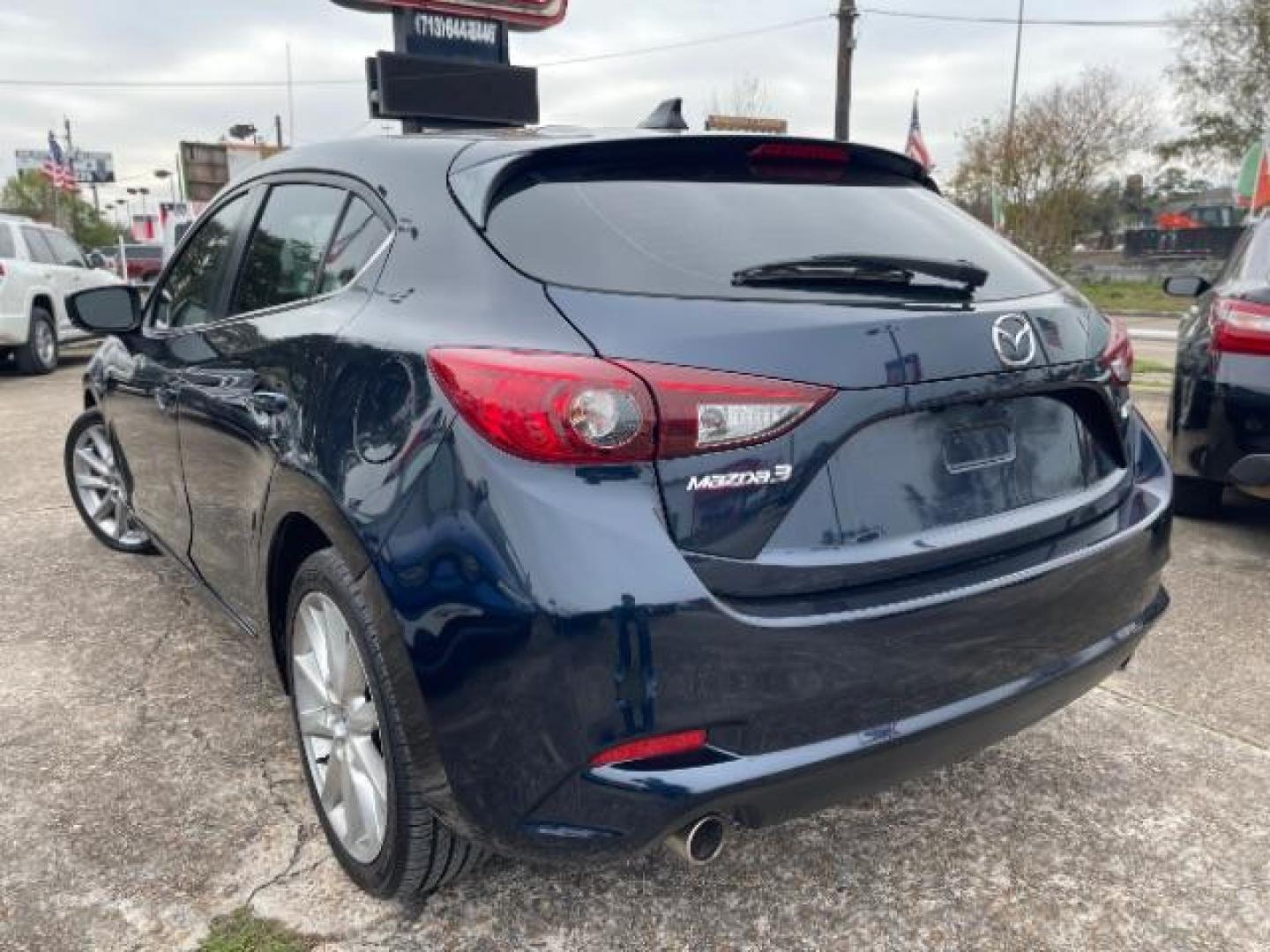 2017 Deep Crystal Blue Mica Mazda Mazda3 Touring Hatchback 4D (3MZBN1L75HM) with an 2.0 engine, Automatic transmission, located at 7935 Gulf Freeway, Houston, 77017, (832) 266-1645, 29.684393, -95.275665 - Photo#4