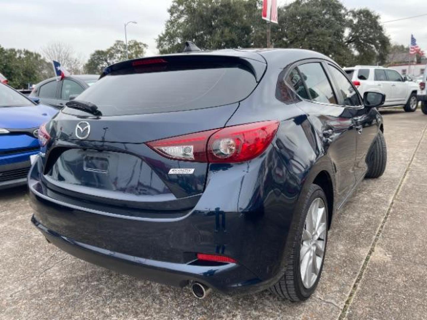 2017 Deep Crystal Blue Mica Mazda Mazda3 Touring Hatchback 4D (3MZBN1L75HM) with an 2.0 engine, Automatic transmission, located at 7935 Gulf Freeway, Houston, 77017, (832) 266-1645, 29.684393, -95.275665 - Photo#6