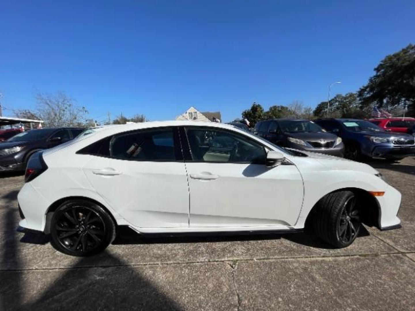 2018 White Orchid Pearl Honda Civic Sport (SHHFK7H41JU) with an 1.5L I-4 gasoline direct injection engine, Continuously Variable Transmission transmission, located at 7935 Gulf Freeway, Houston, 77017, (832) 266-1645, 29.684393, -95.275665 - Photo#7