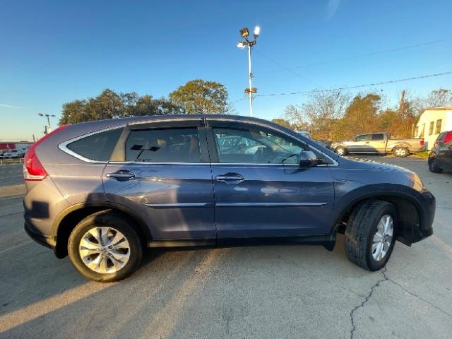 2014 Twilight Blue Metallic Honda CR-V EX Sport Utility 4D (2HKRM4H52EH) with an 2.4 engine, AUTOMATIC transmission, located at 7935 Gulf Freeway, Houston, 77017, (832) 266-1645, 29.684393, -95.275665 - Photo#7