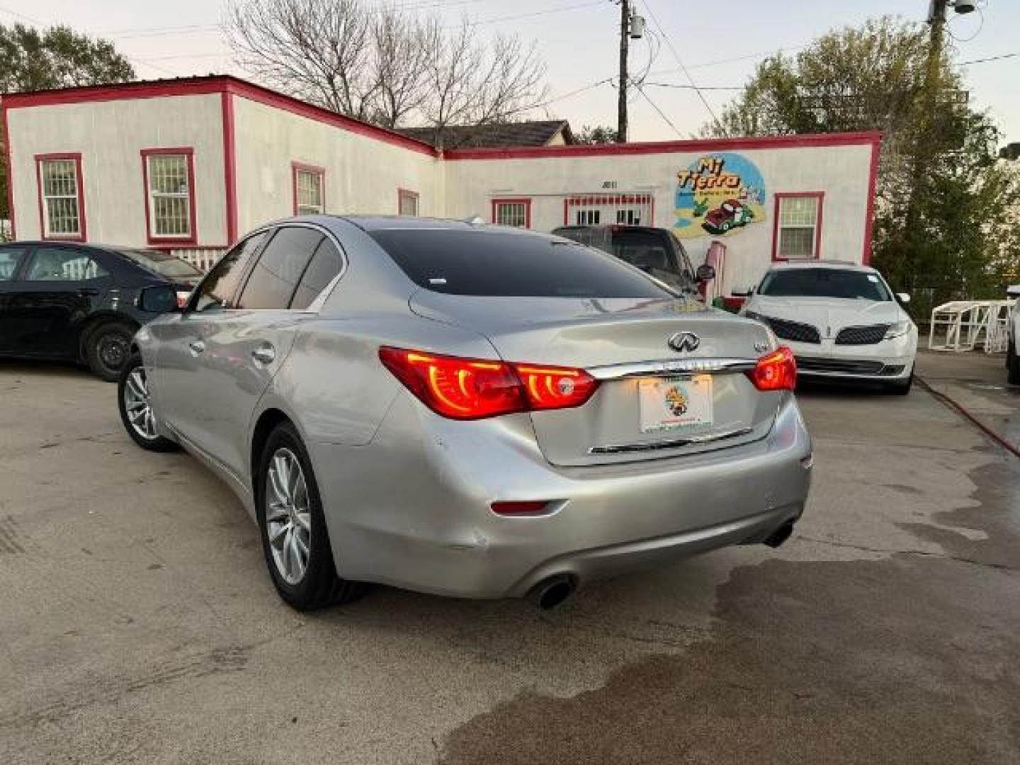 2015 Liquid Platinum /Black Infiniti Q50 3.7 Premium Sedan 4D (JN1BV7AP5FM) with an 3.7 engine, Automatic transmission, located at 7935 Gulf Freeway, Houston, 77017, (832) 266-1645, 29.684393, -95.275665 - Photo#4