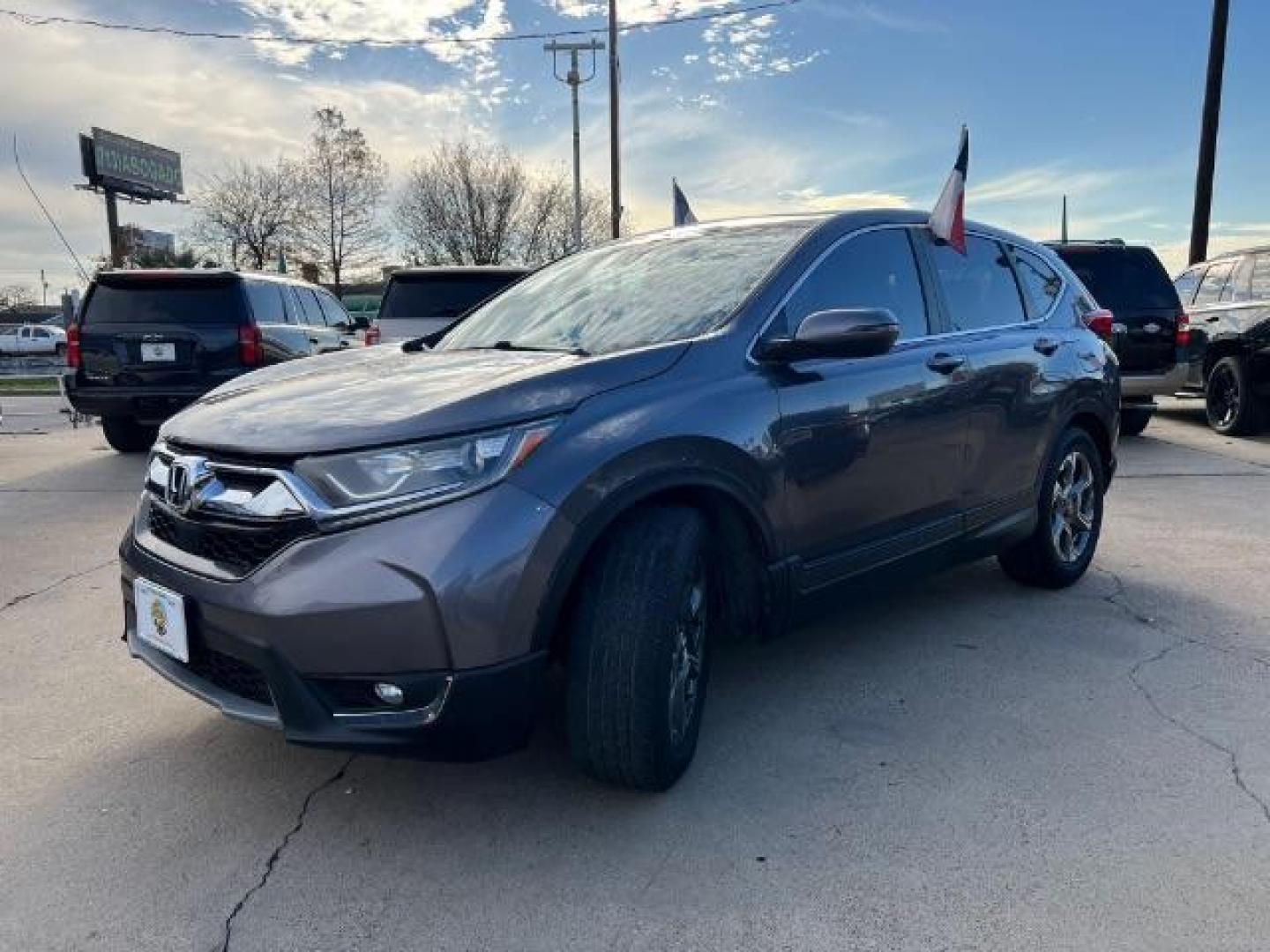 2017 Gunmetal Metallic /Gray Honda CR-V EX Sport Utility 4D (2HKRW1H59HH) with an 1.5 engine, Continuously Variable Transmission transmission, located at 7935 Gulf Freeway, Houston, 77017, (832) 266-1645, 29.684393, -95.275665 - Photo#2