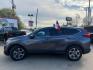 2017 Gunmetal Metallic /Gray Honda CR-V EX Sport Utility 4D (2HKRW1H59HH) with an 1.5 engine, Continuously Variable Transmission transmission, located at 7935 Gulf Freeway, Houston, 77017, (832) 266-1645, 29.684393, -95.275665 - Photo#3