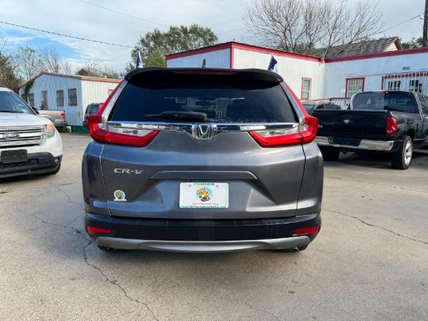 2017 Gunmetal Metallic /Gray Honda CR-V EX Sport Utility 4D (2HKRW1H59HH) with an 1.5 engine, Continuously Variable Transmission transmission, located at 7935 Gulf Freeway, Houston, 77017, (832) 266-1645, 29.684393, -95.275665 - Photo#5