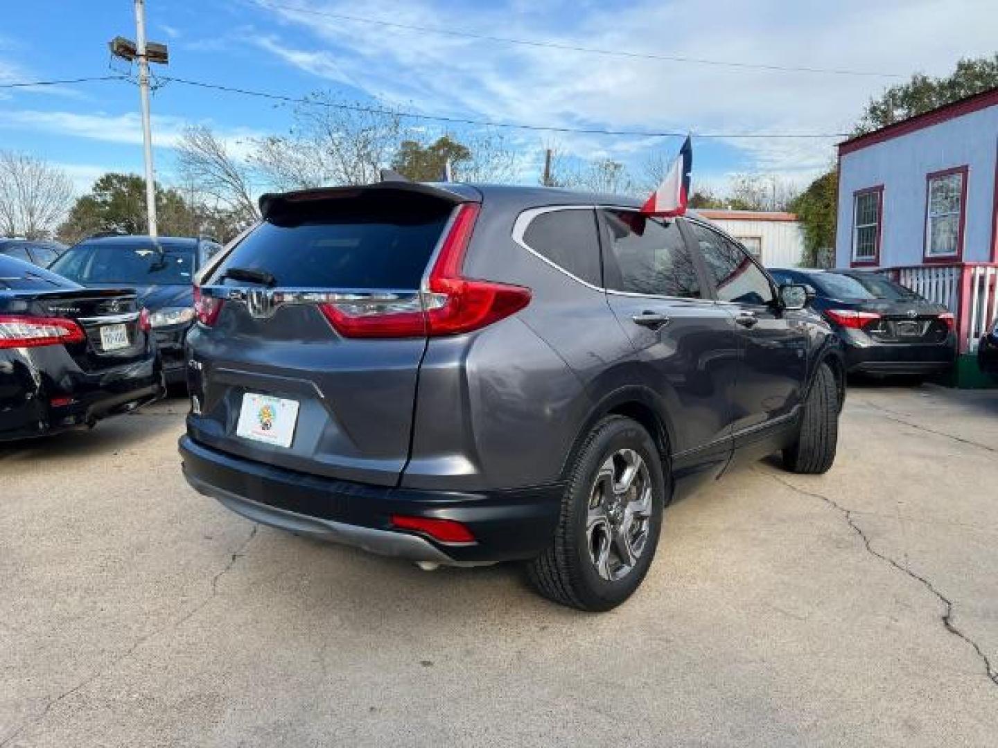 2017 Gunmetal Metallic /Gray Honda CR-V EX Sport Utility 4D (2HKRW1H59HH) with an 1.5 engine, Continuously Variable Transmission transmission, located at 7935 Gulf Freeway, Houston, 77017, (832) 266-1645, 29.684393, -95.275665 - Photo#6