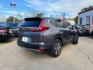 2017 Gunmetal Metallic /Gray Honda CR-V EX Sport Utility 4D (2HKRW1H59HH) with an 1.5 engine, Continuously Variable Transmission transmission, located at 7935 Gulf Freeway, Houston, 77017, (832) 266-1645, 29.684393, -95.275665 - Photo#6