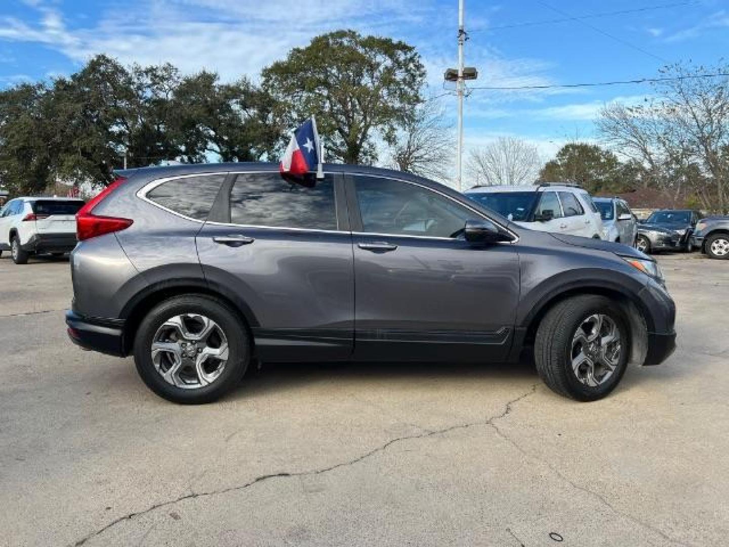 2017 Gunmetal Metallic /Gray Honda CR-V EX Sport Utility 4D (2HKRW1H59HH) with an 1.5 engine, Continuously Variable Transmission transmission, located at 7935 Gulf Freeway, Houston, 77017, (832) 266-1645, 29.684393, -95.275665 - Photo#7