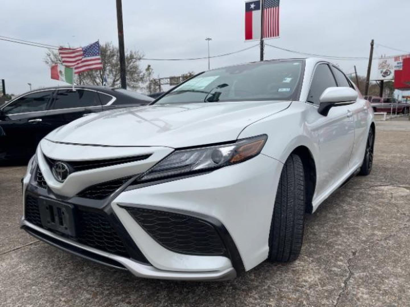 2021 Wind Chill Pearl /Black Toyota Camry XSE (4T1K61AK3MU) with an 2.5 engine, Automatic transmission, located at 7935 Gulf Freeway, Houston, 77017, (832) 266-1645, 29.684393, -95.275665 - Photo#2