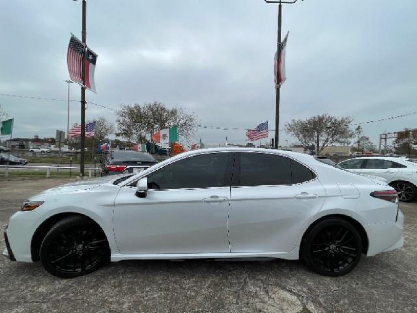 2021 Wind Chill Pearl /Black Toyota Camry XSE (4T1K61AK3MU) with an 2.5 engine, Automatic transmission, located at 7935 Gulf Freeway, Houston, 77017, (832) 266-1645, 29.684393, -95.275665 - Photo#3