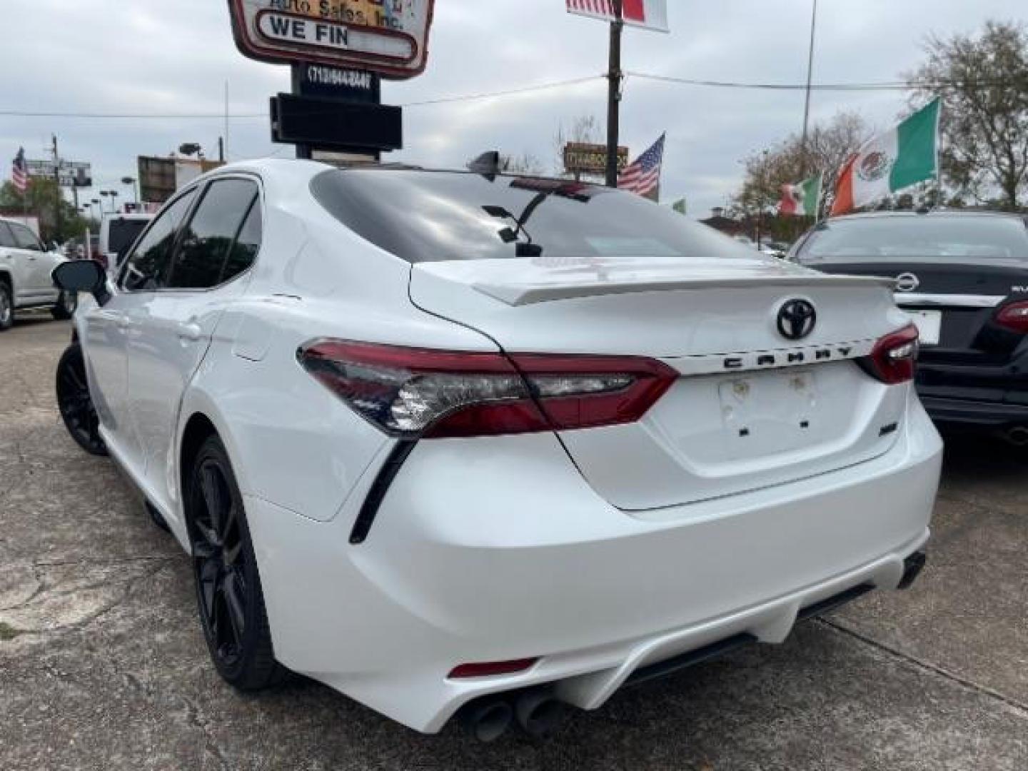 2021 Wind Chill Pearl /Black Toyota Camry XSE (4T1K61AK3MU) with an 2.5 engine, Automatic transmission, located at 7935 Gulf Freeway, Houston, 77017, (832) 266-1645, 29.684393, -95.275665 - Photo#4