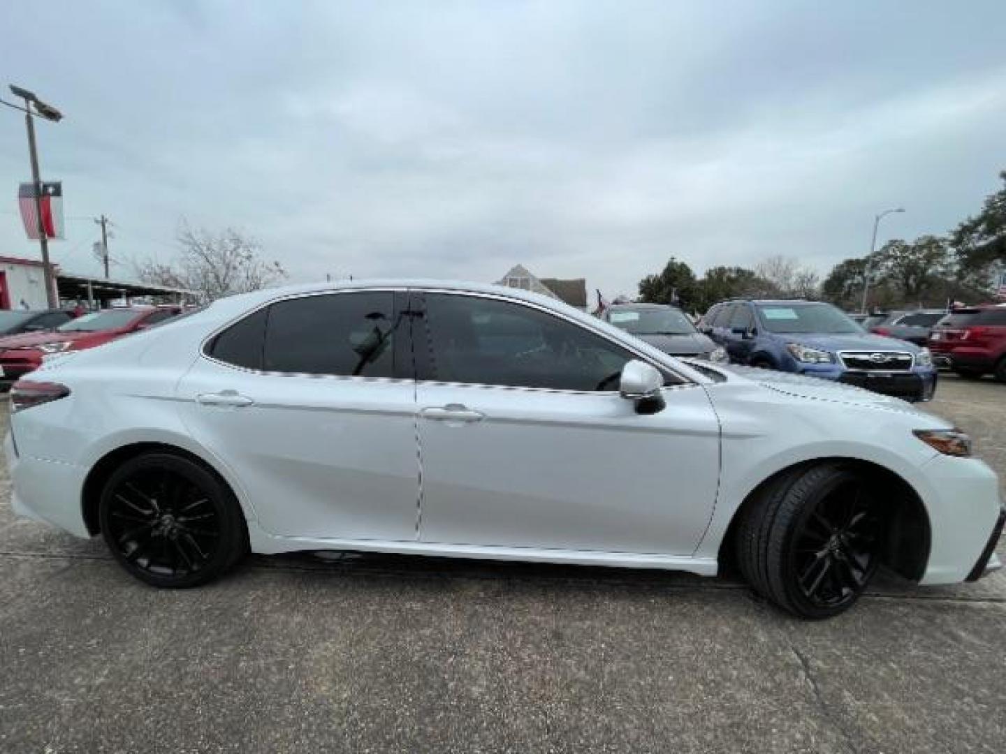 2021 Wind Chill Pearl /Black Toyota Camry XSE (4T1K61AK3MU) with an 2.5 engine, Automatic transmission, located at 7935 Gulf Freeway, Houston, 77017, (832) 266-1645, 29.684393, -95.275665 - Photo#7