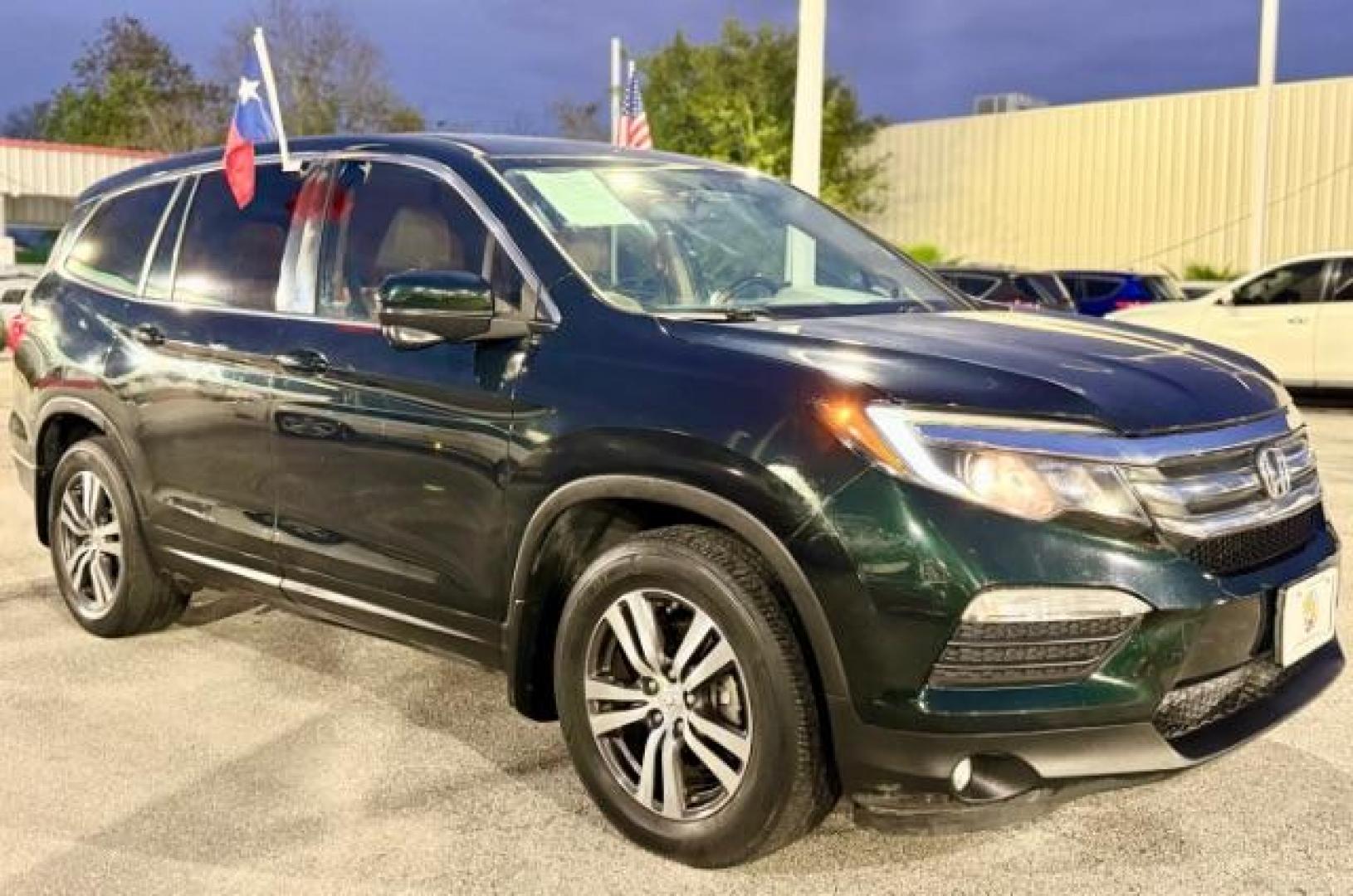 2016 Black Forest Pearl Honda Pilot EXL 2WD (5FNYF5H56GB) with an 3.5L V6 SOHC 24V engine, 6-Speed Automatic transmission, located at 4545 Spencer Hwy., Pasadena, 77504, (832) 266-1645, 29.666037, -95.173775 - Photo#3