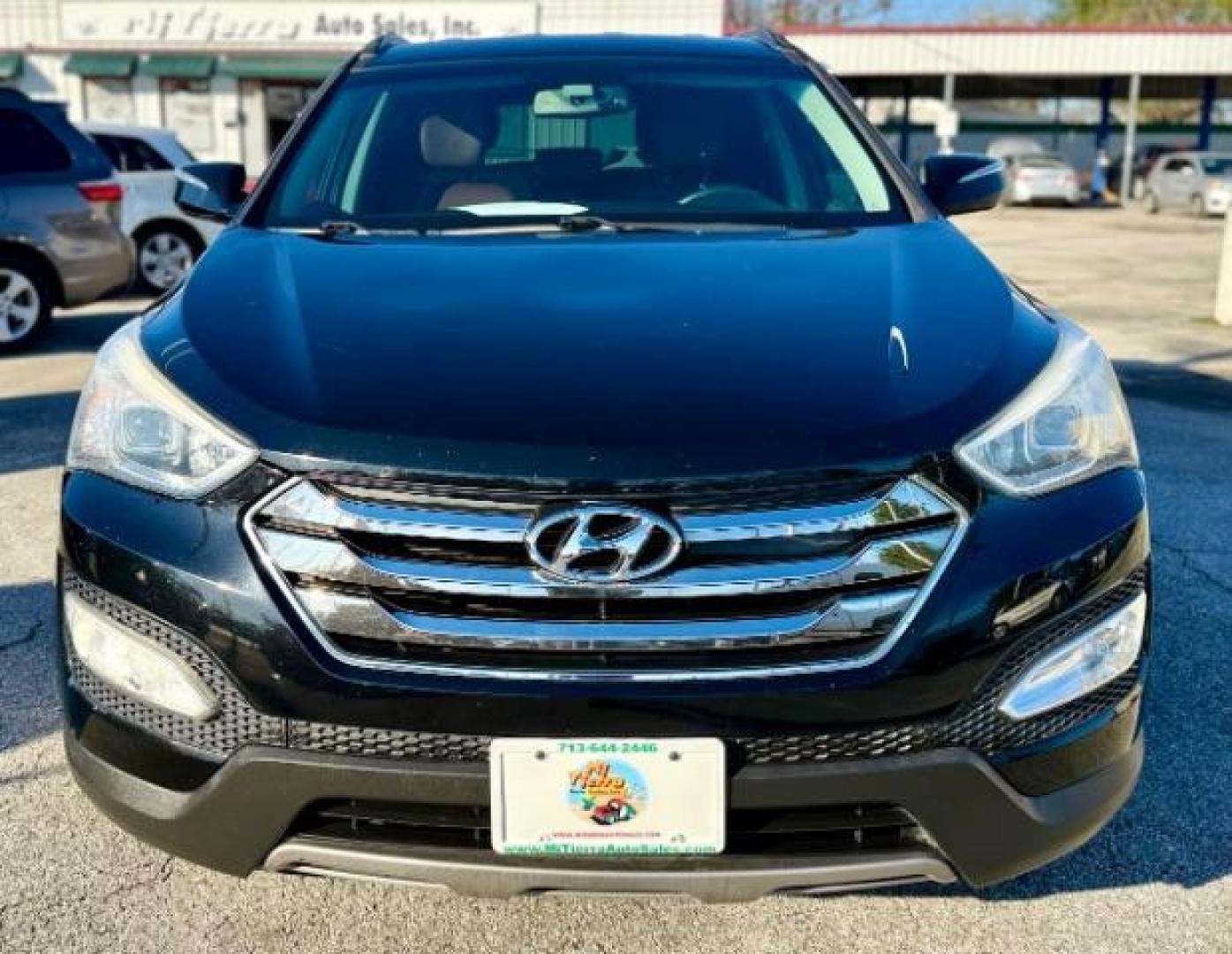 2013 Black /Brown/Black Hyundai Santa Fe SE Sport (5XYZU3LA1DG) with an 2.0 L 4-cylinder engine, 6-speed automatic transmission, located at 4545 Spencer Hwy., Pasadena, 77504, (832) 266-1645, 29.666037, -95.173775 - Photo#0