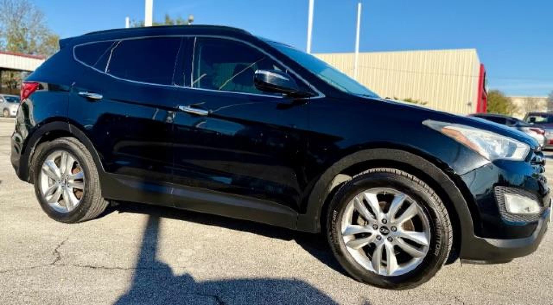 2013 Black /Brown/Black Hyundai Santa Fe SE Sport (5XYZU3LA1DG) with an 2.0 L 4-cylinder engine, 6-speed automatic transmission, located at 4545 Spencer Hwy., Pasadena, 77504, (832) 266-1645, 29.666037, -95.173775 - Photo#2